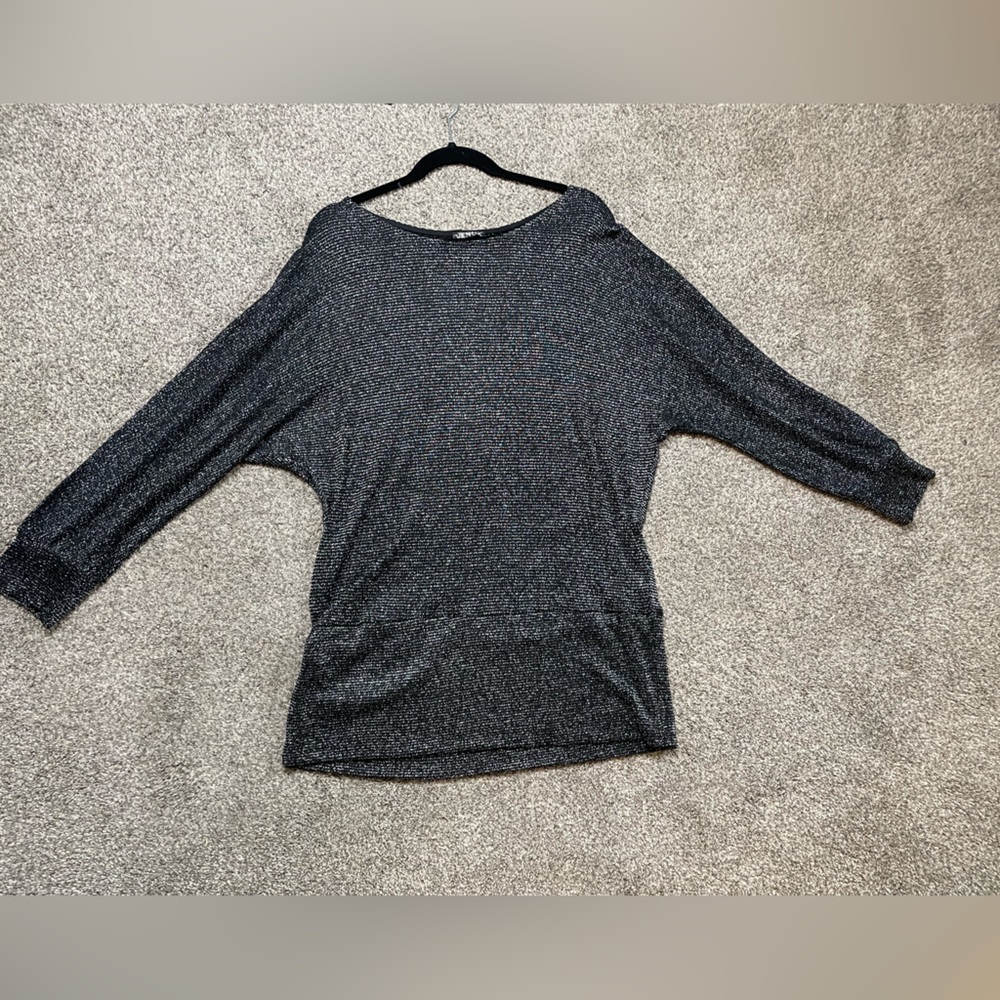 Venus. Xl. Black metallic in color.